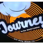 Journey to the world cuisine with multiple circle engraved one inside other 3d board with chef cap on top and inbuilt lighting