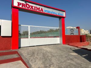 Entrance gate of Proxima International School with premium custom sign boards, designed and installed by Pune Boardwala, known for High-Quality Custom Sign Boards in Pune.﻿